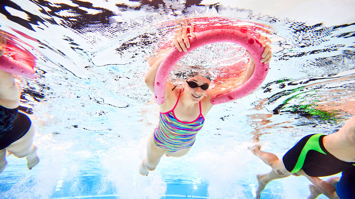 beginner_swimming_with_float_ Float in water